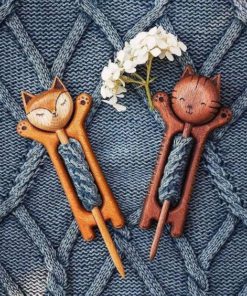 Wooden shawl pin with animal pattern