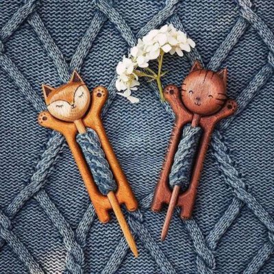 Wooden shawl pin with animal pattern
