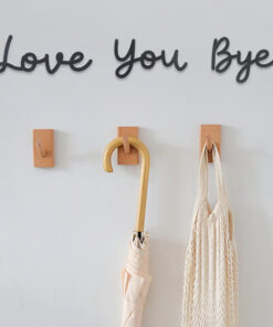 The versatile Love You Bye Boho Wooden Sign complements both modern and bohemian interior styles.