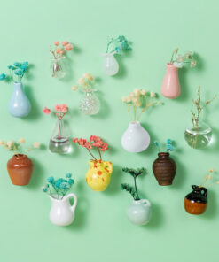 Magnetic Earthenware Flower Vases feature a unique design and hold flowers on any magnetic surface.