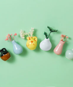 Bring nature indoors with Magnetic Earthenware Flower Vases, ideal for fridge or whiteboard use.